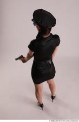 Woman Adult Athletic White Fighting with gun Standing poses Casual